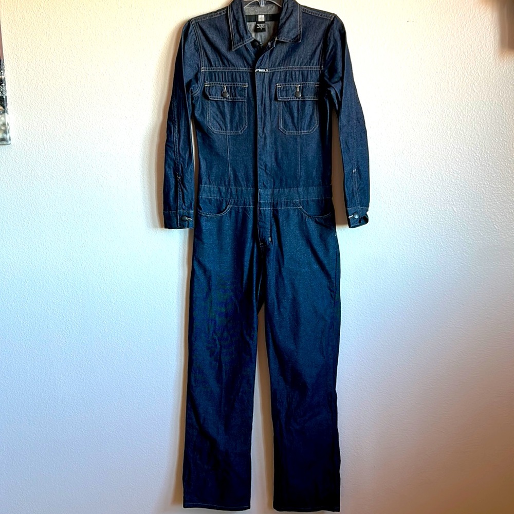 Dark vintage denim jumpsuit. No stretch fabric.